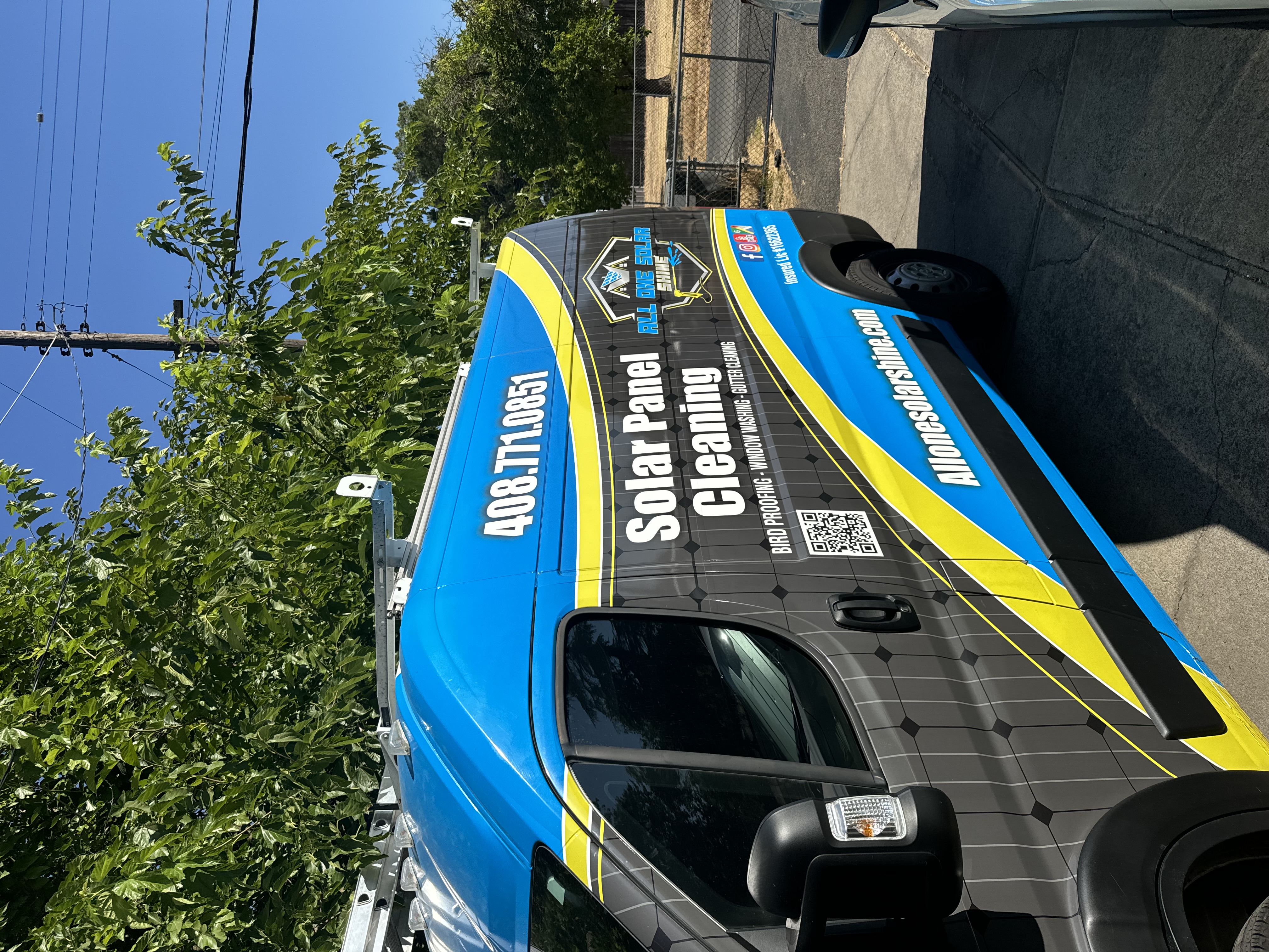 All One Solar Shine service van at a residential job site