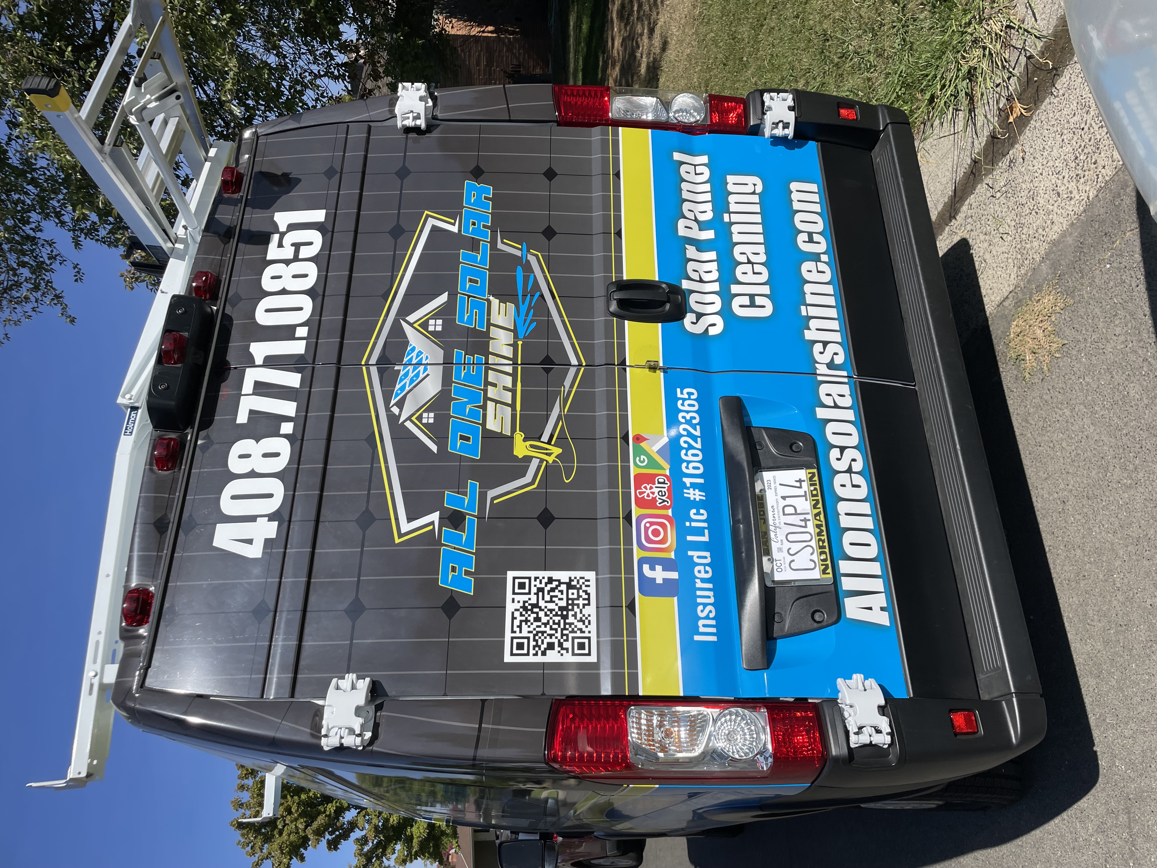 All One Solar Shine service van on a commercial property street